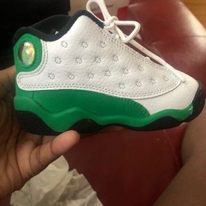 2 used pair of shoes in good condition Jordan and foam posits size 6 in toddler